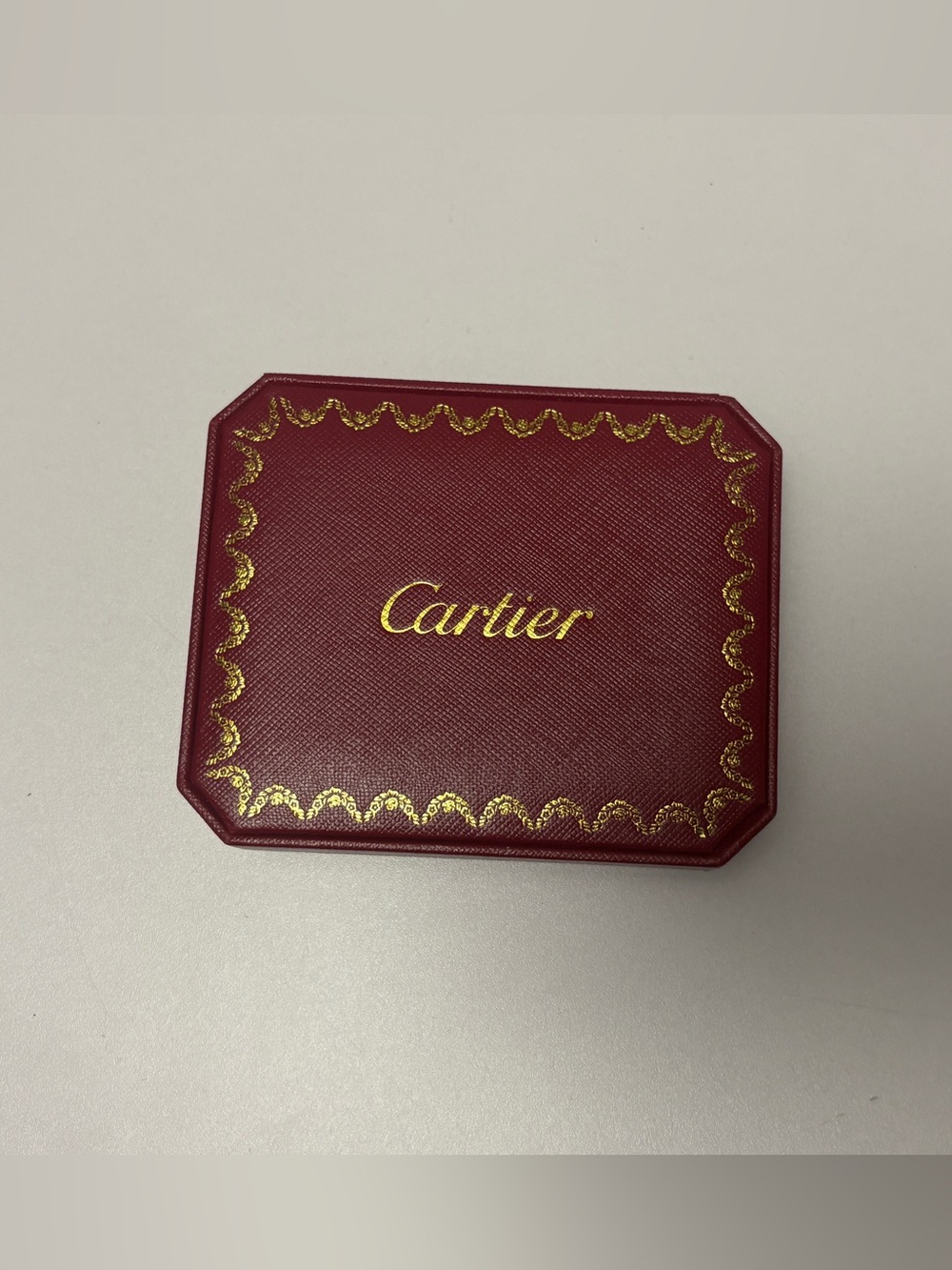 Cartier Burgundy Jewelry Box with Gold Accents